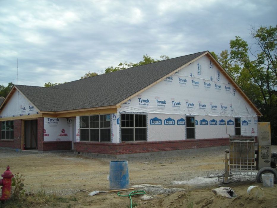 Exterior view of new unit with construction ongoing.