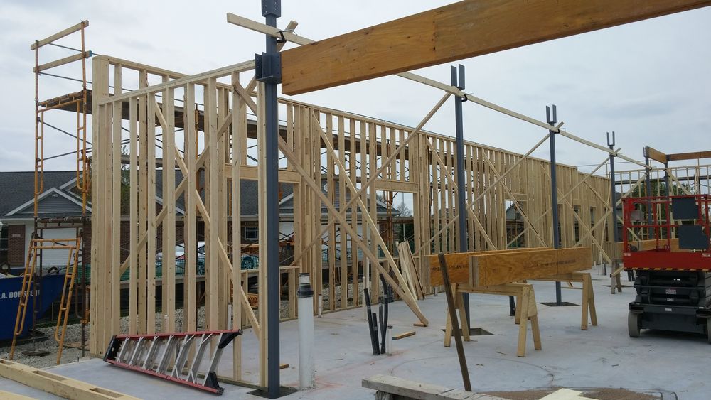 Wood framing ongoing for new addition to existing dental clinic.
