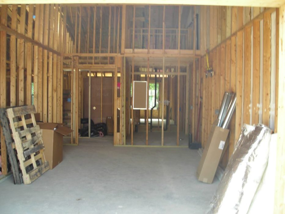 Interior view with exposed wood framing.