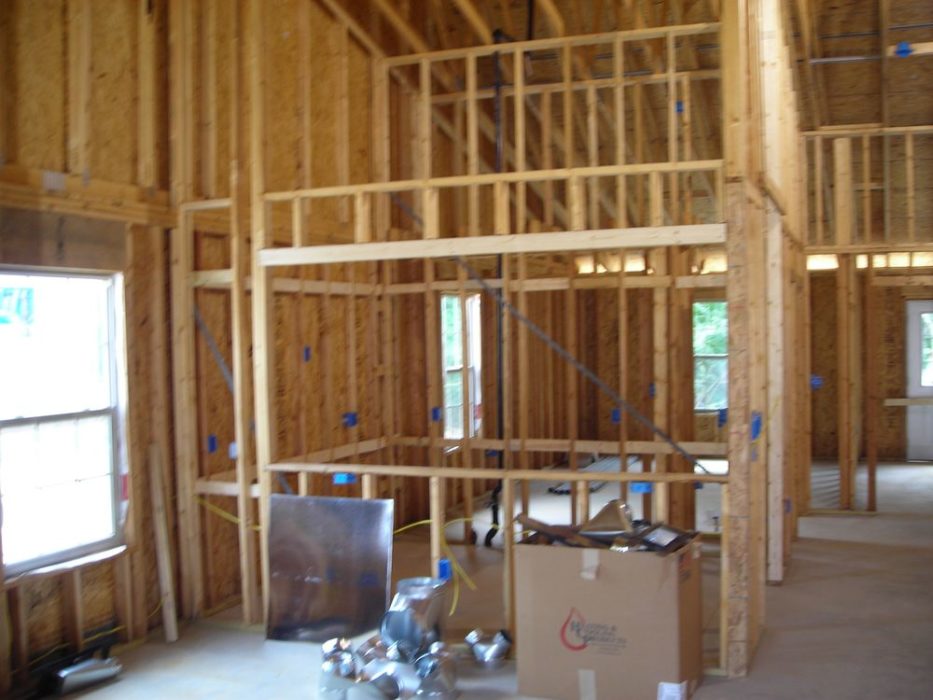 Interior view with exposed wood framing.