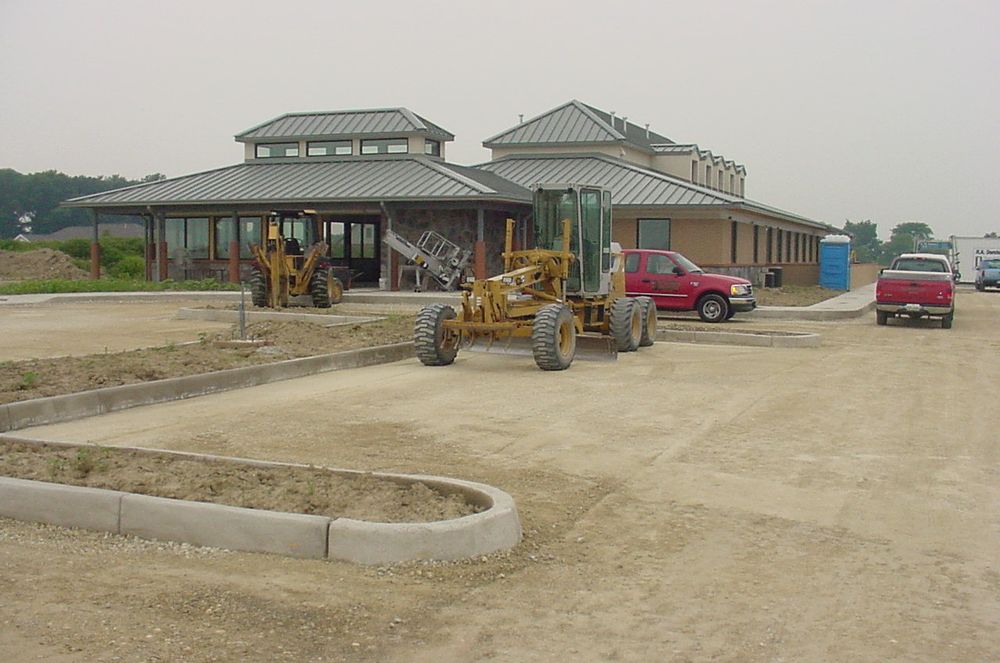 Exterior shell of new dental center with construction ongoing.