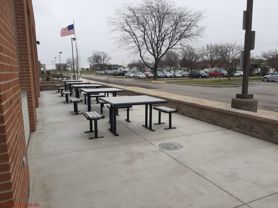 New site furniture out front of school.