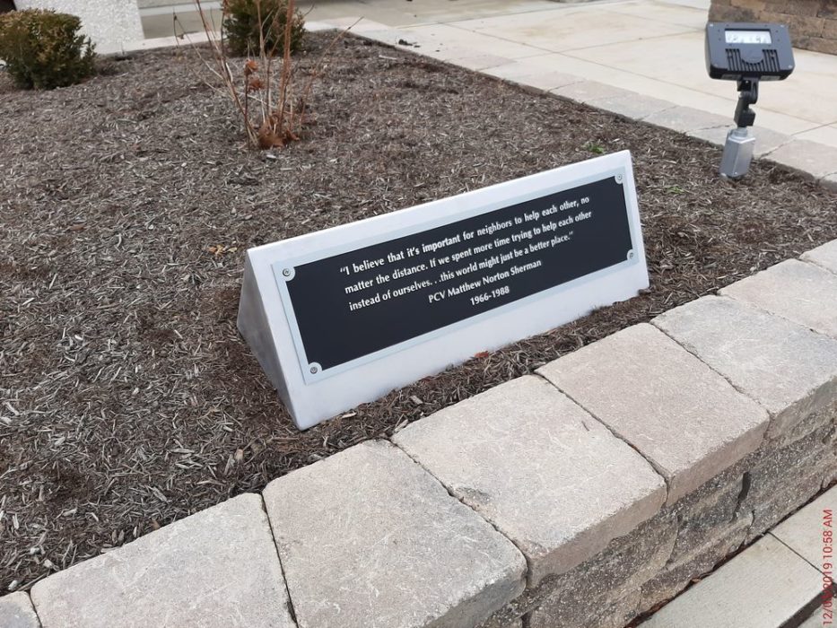 Dedication plaque out front of school.