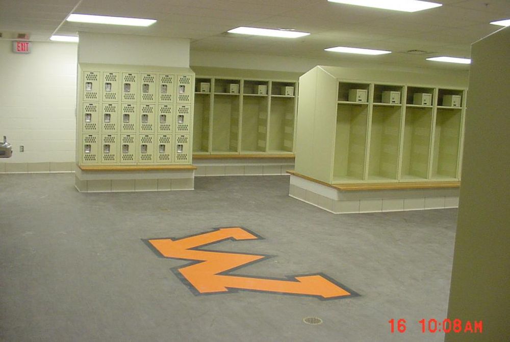 Interior view of locker room with decorative flooring.