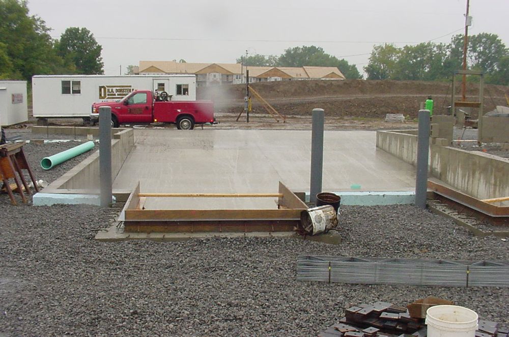 Concrete loading docks formed with gravel base down for building pad.
