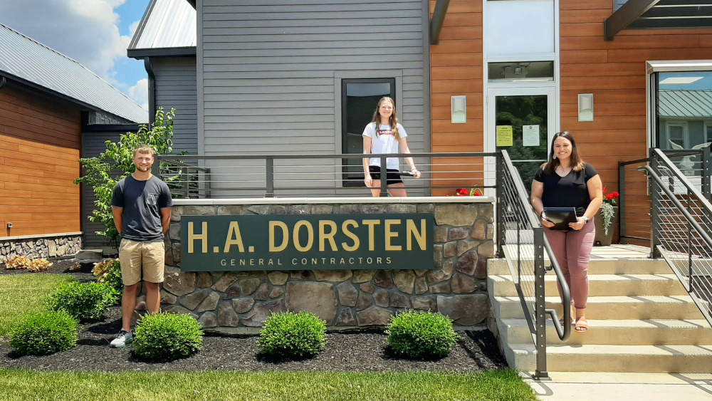 Group photo of all 3 winners on the front porch of H.A. Dorsten.