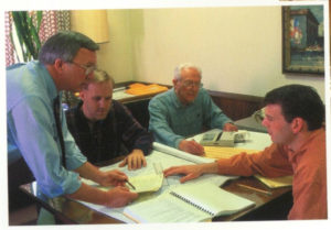 Morris, Sean, Ron, and Harold working on a bid.